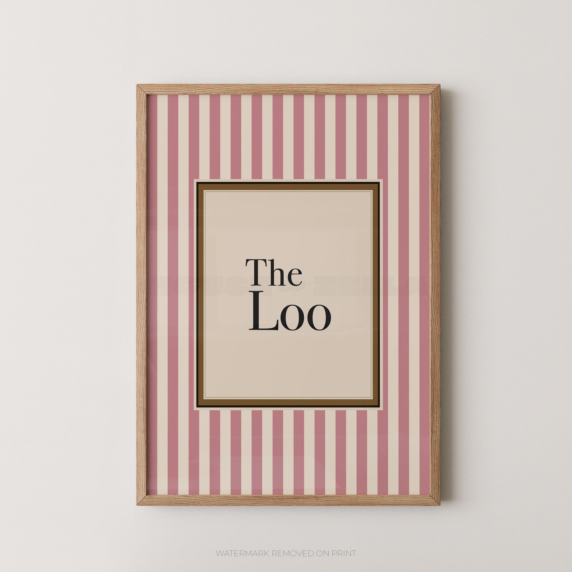Framed artwork with 'The Loo' text on a pink and white striped background