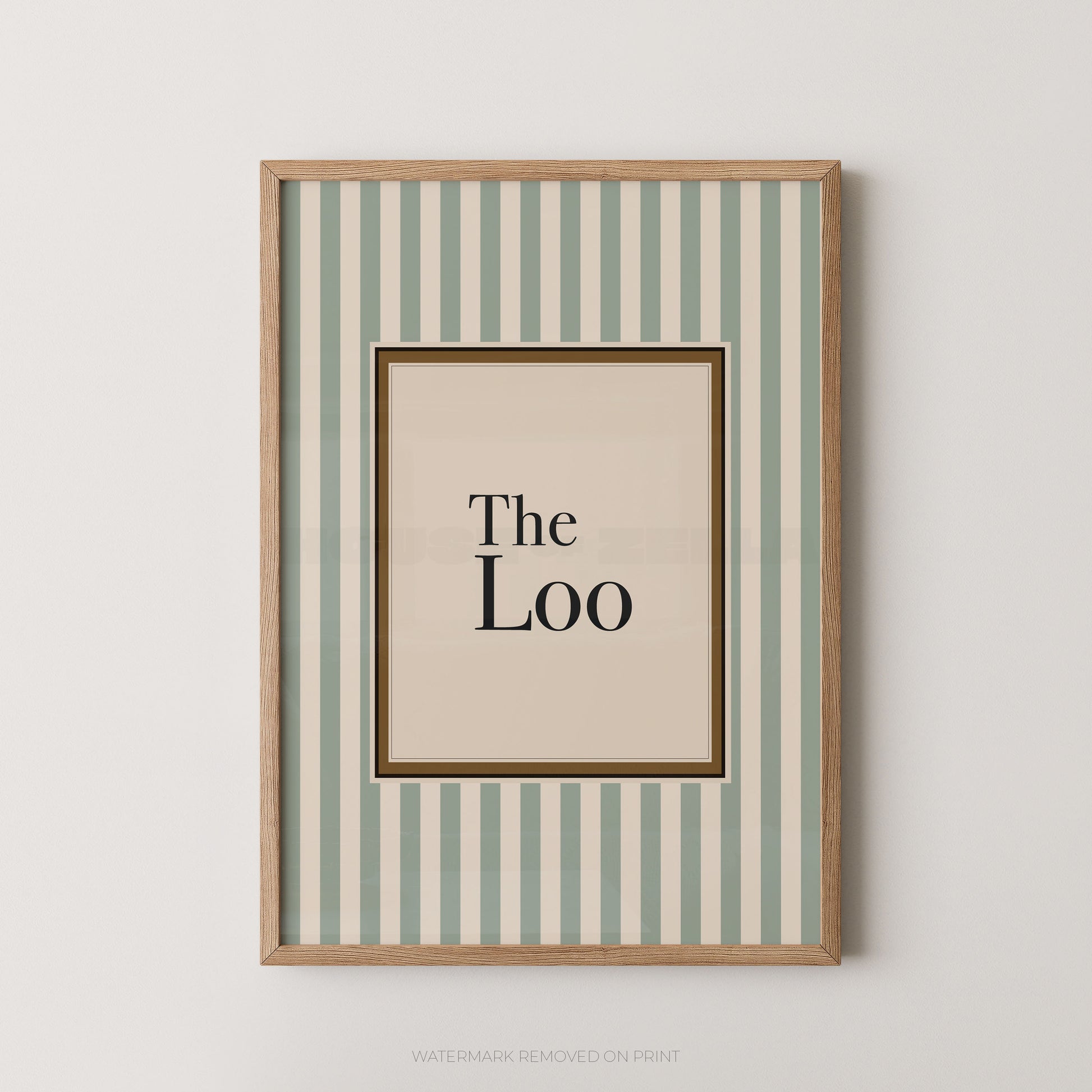 Framed artwork with 'The Loo' text on a striped background