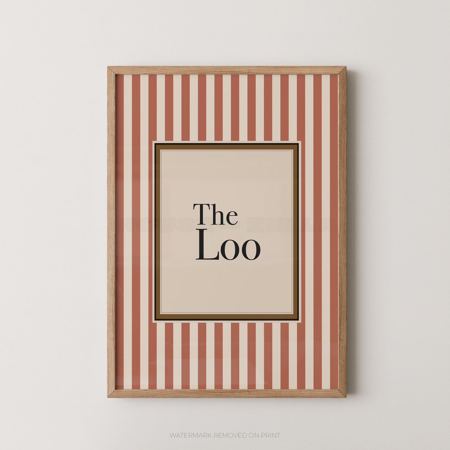 Framed artwork with 'The Loo' text on a striped background