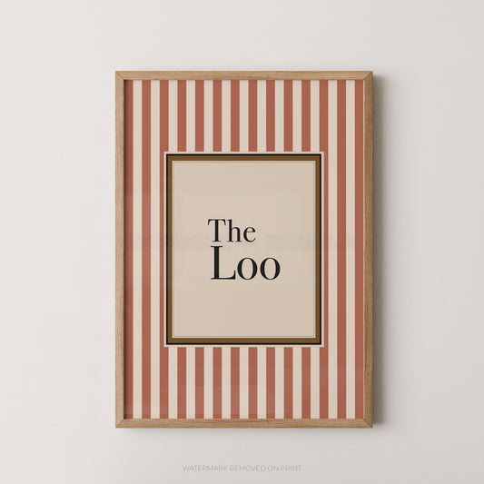 Framed artwork with 'The Loo' text on a striped background