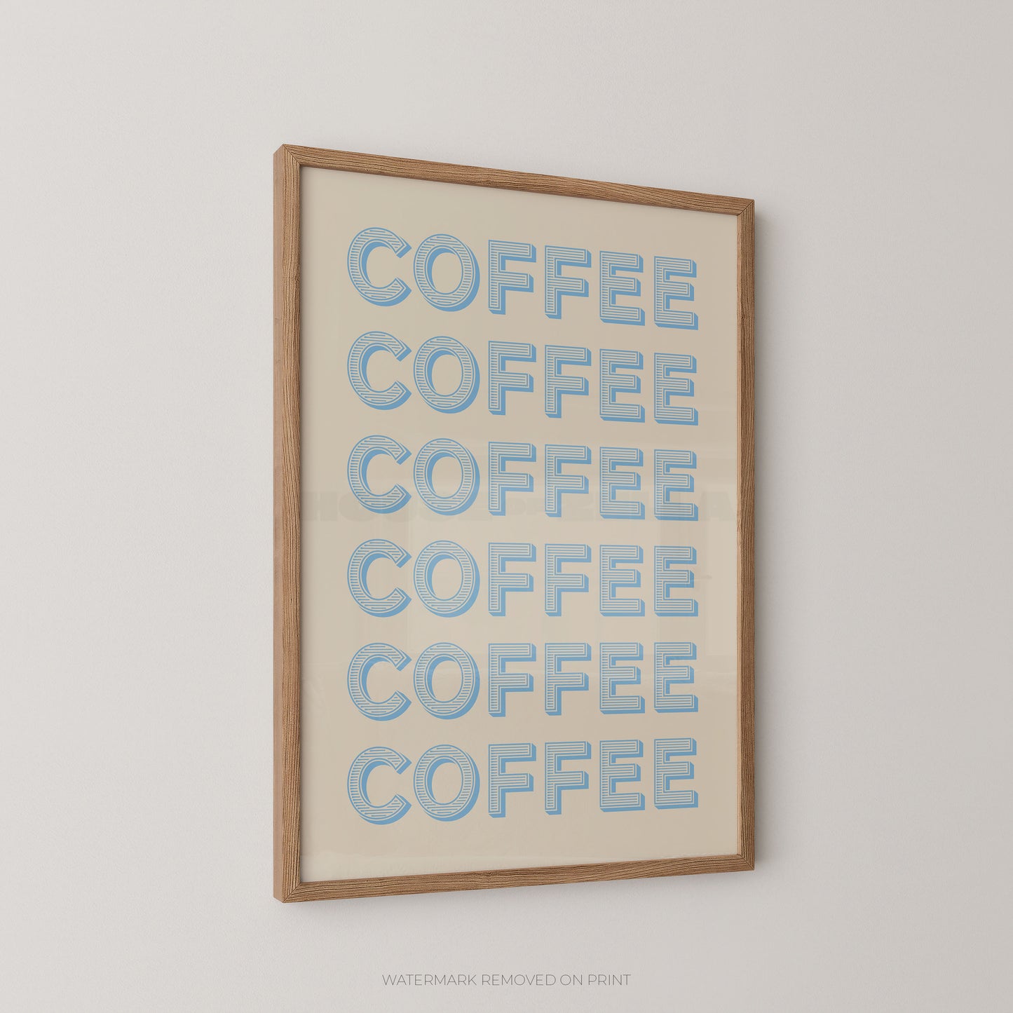 Framed wall art featuring the word 'COFFEE' repeated six times in light blue bubble letters on an off-white background, enclosed in a natural wood frame and shown hanging on a light gray wall.