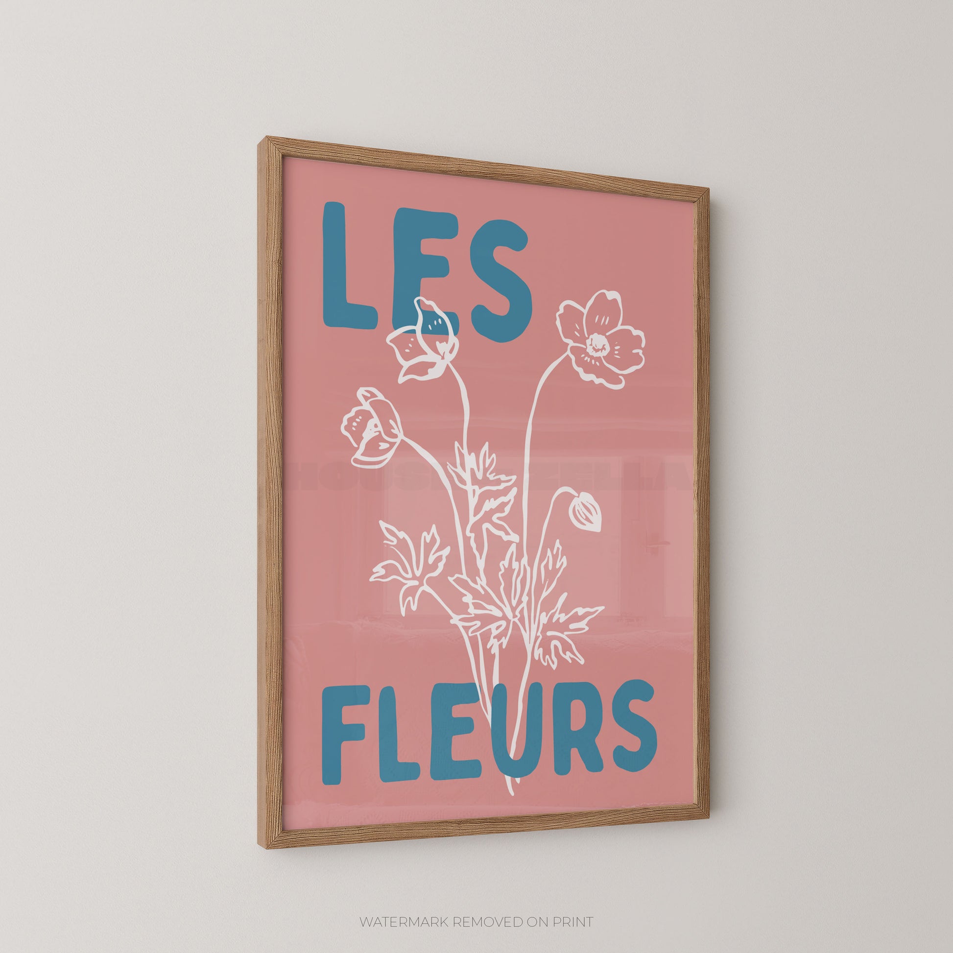 Les Fleurs botanical wall art print, blush pink floral poster with cream botanical illustration and bold blue typography.