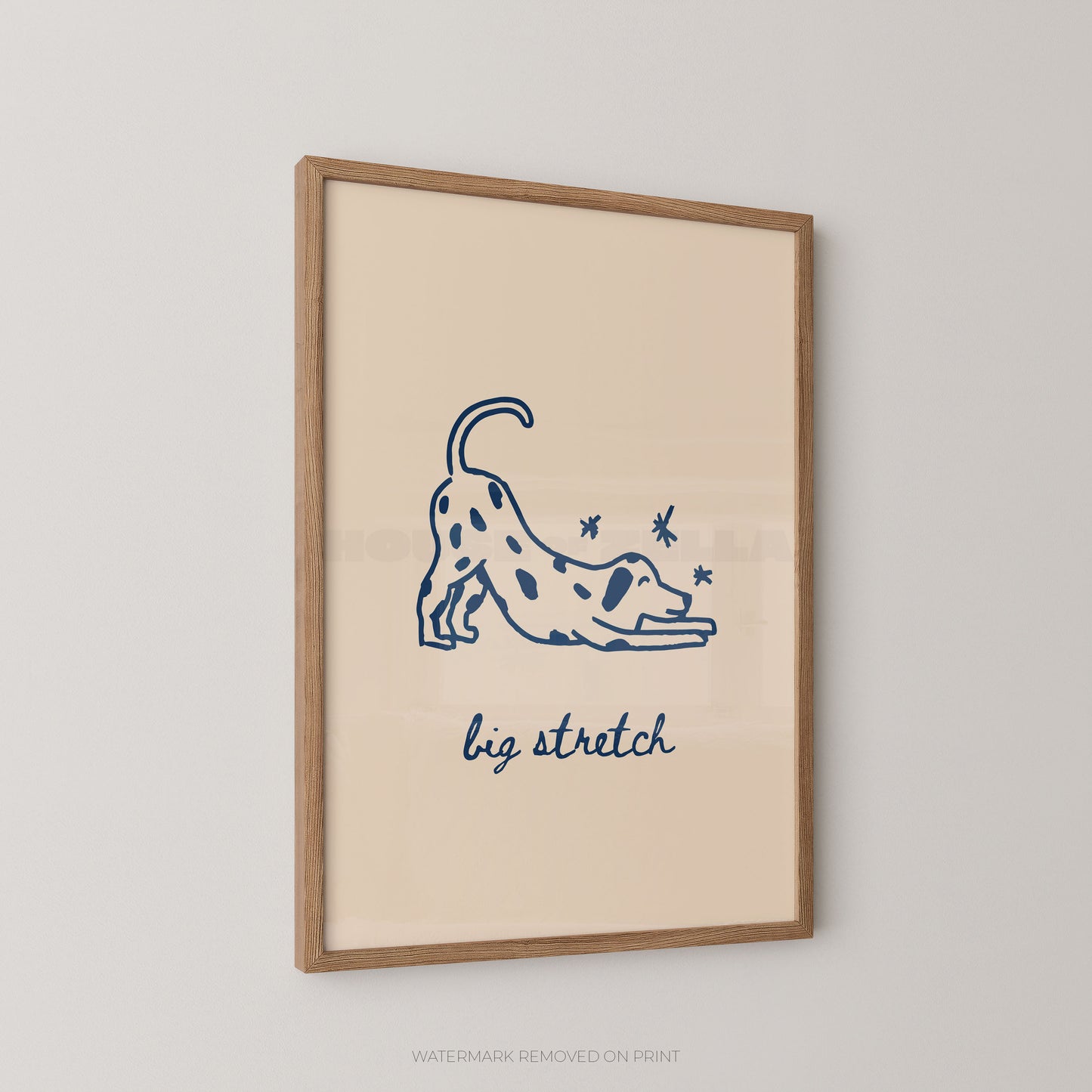 Framed artwork with a blue illustration of a dog stretching and the text 'big stretch' on a beige background.