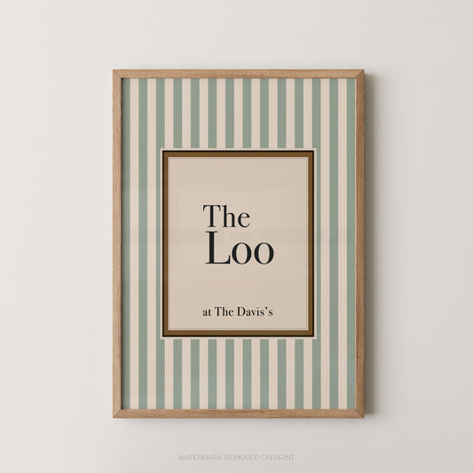 Framed artwork with 'The Loo' text on a striped background