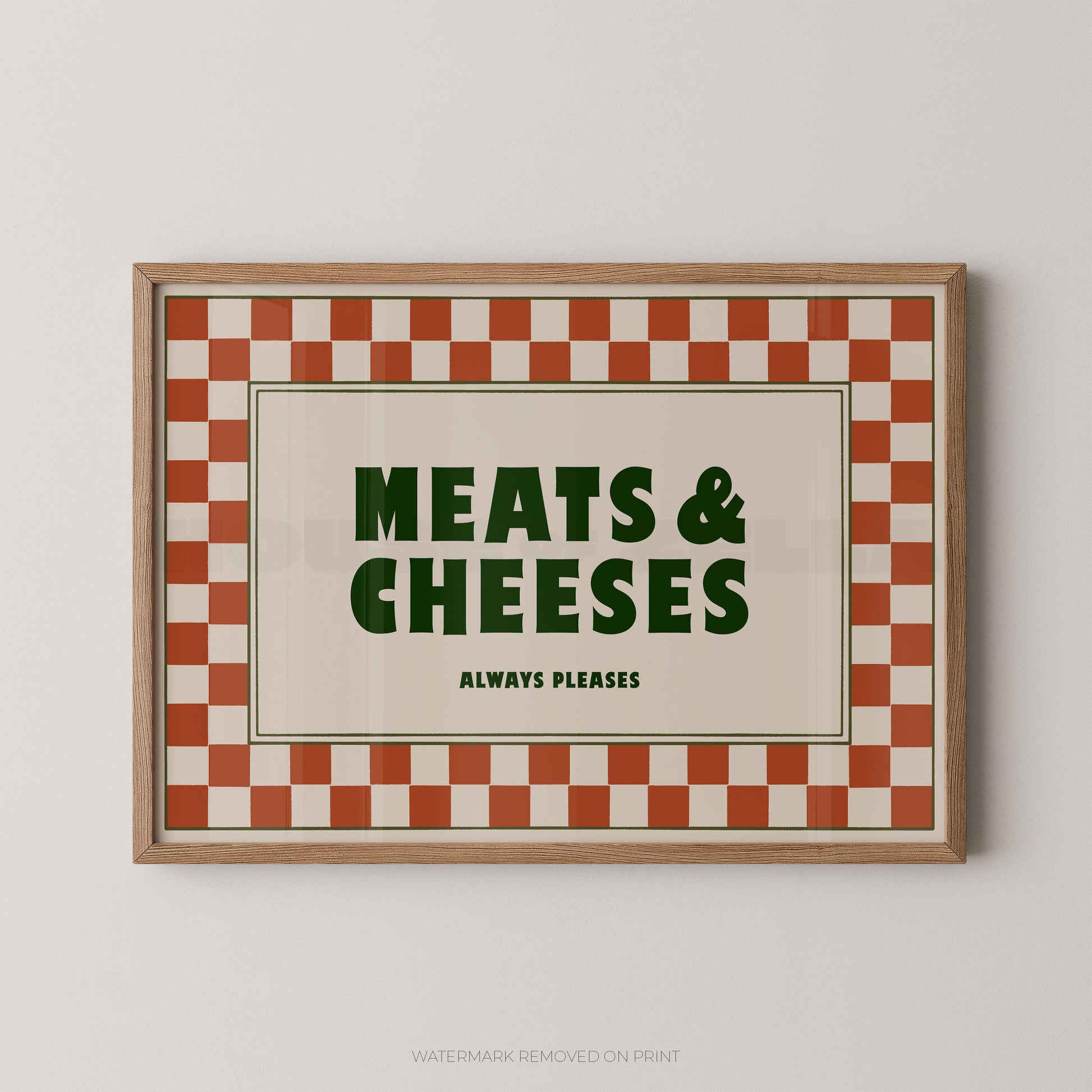 Framed sign with 'Meats & Cheeses Always Please' text on a checkered background