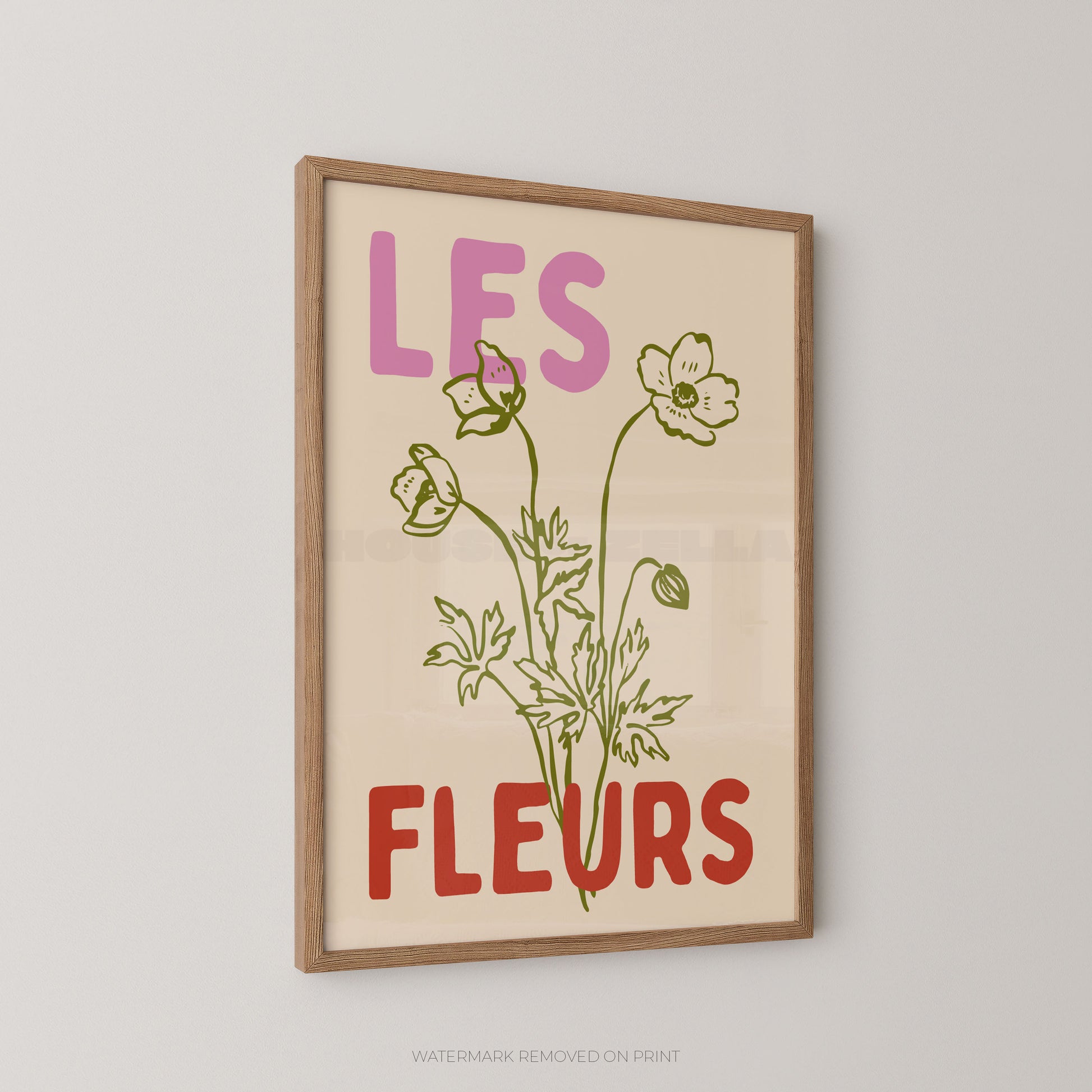 Les Fleurs botanical wall art print, cream floral poster with green botanical illustration and bold pink and red typography.