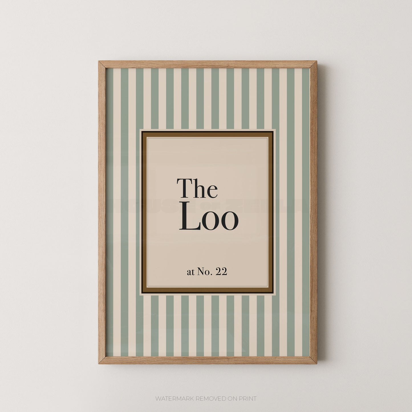 Framed artwork with 'The Loo at No. 22' text on a striped background