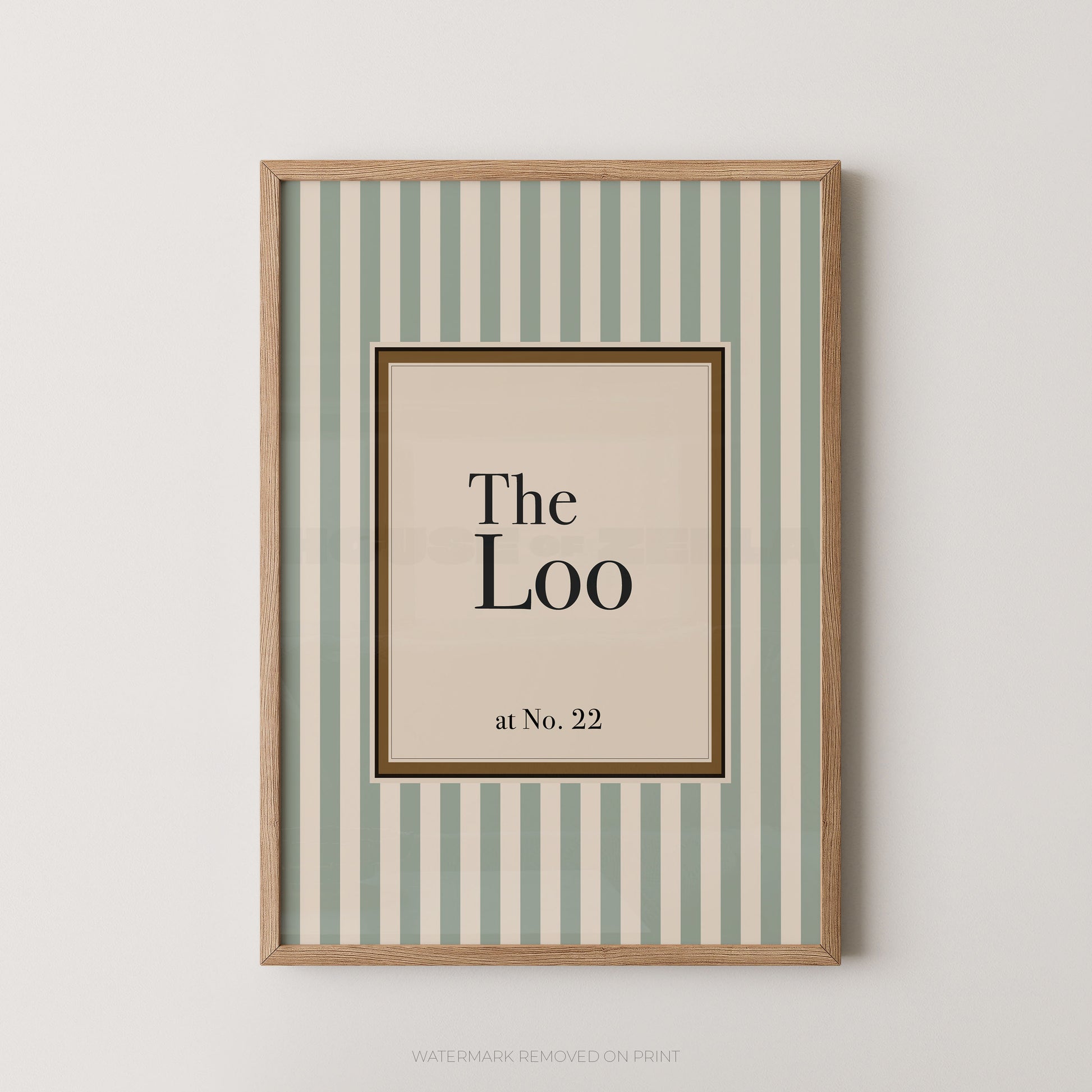 Framed artwork with 'The Loo at No. 22' text on a striped background