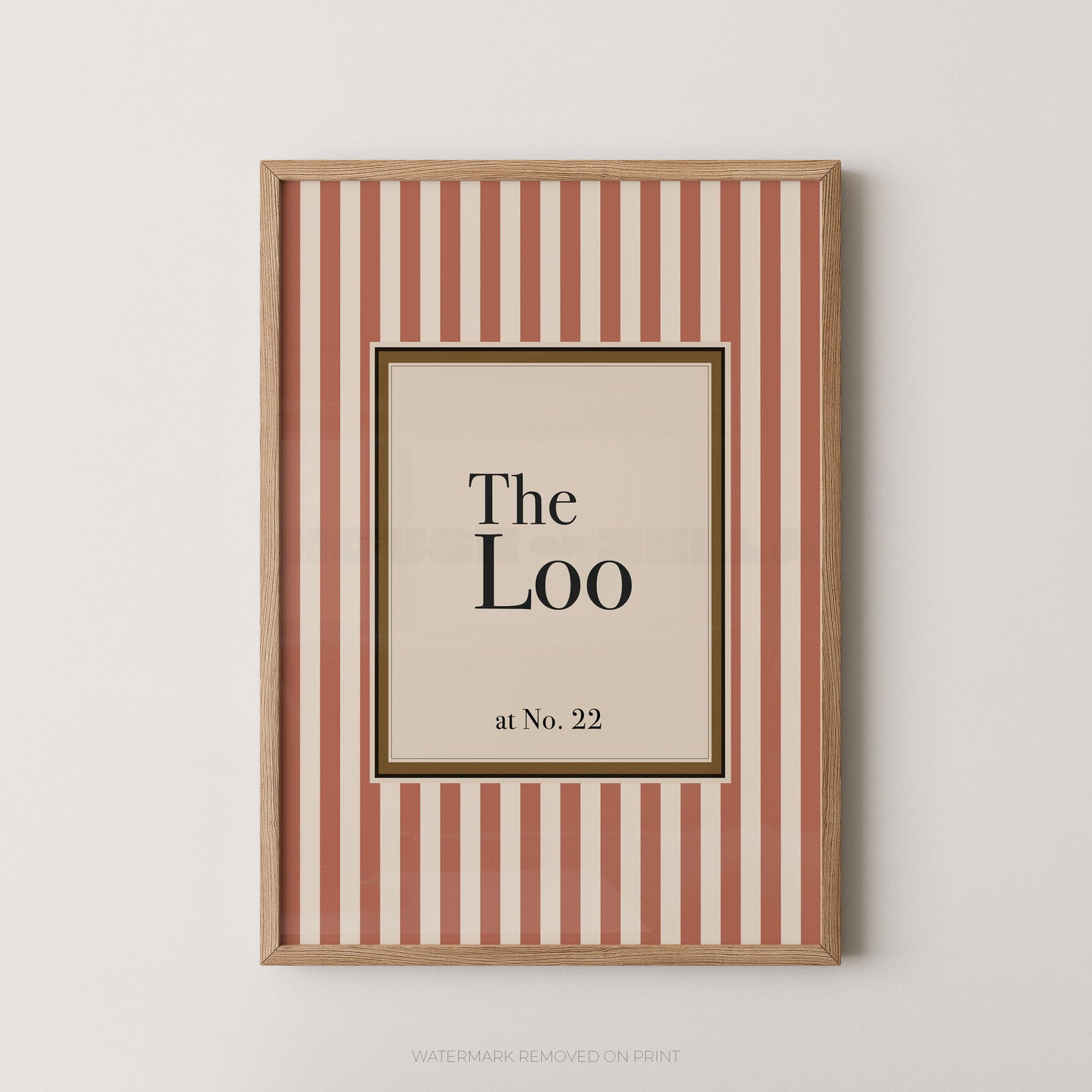 Framed print with 'The Loo at No. 22' text on a striped background