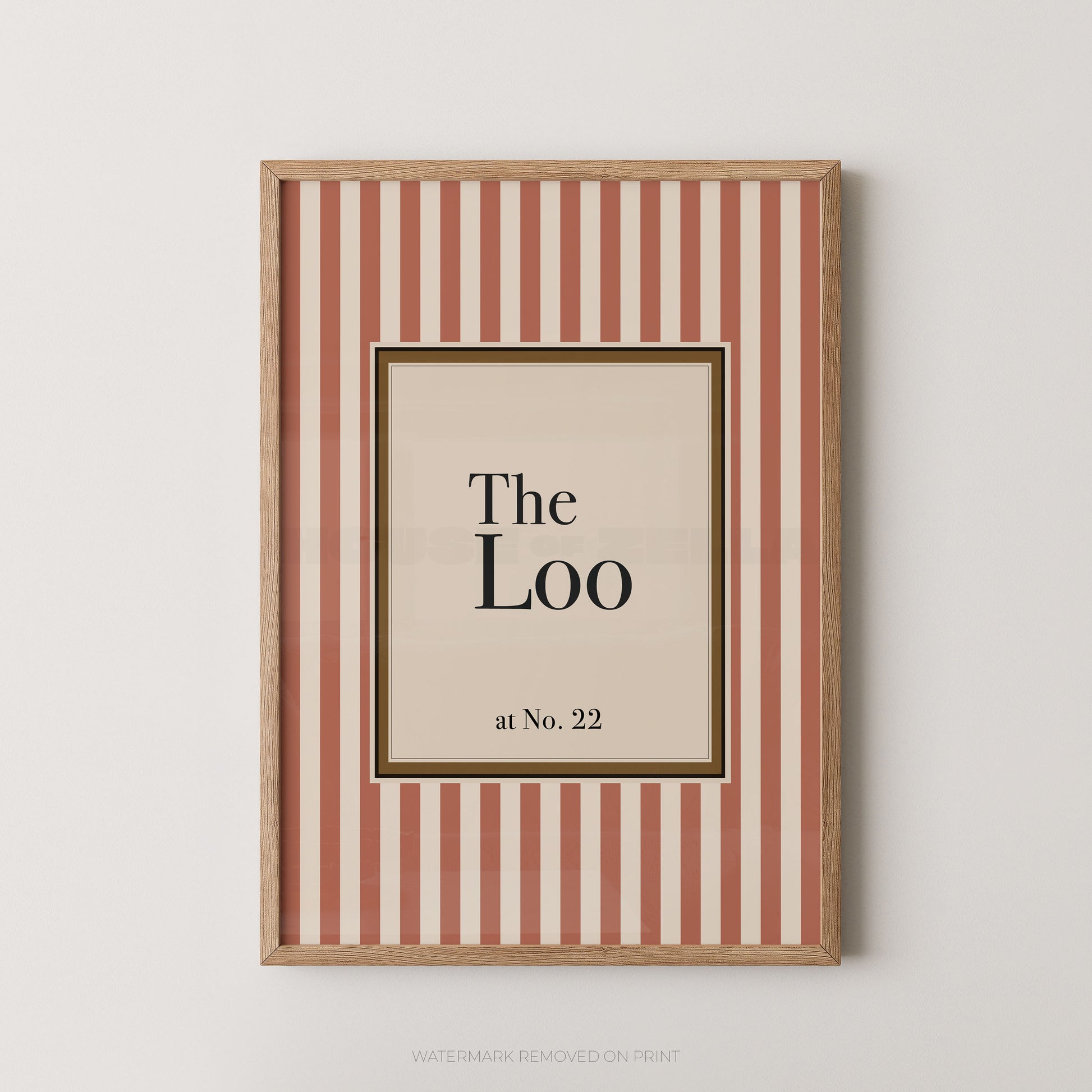 Framed print with 'The Loo at No. 22' text on a striped background