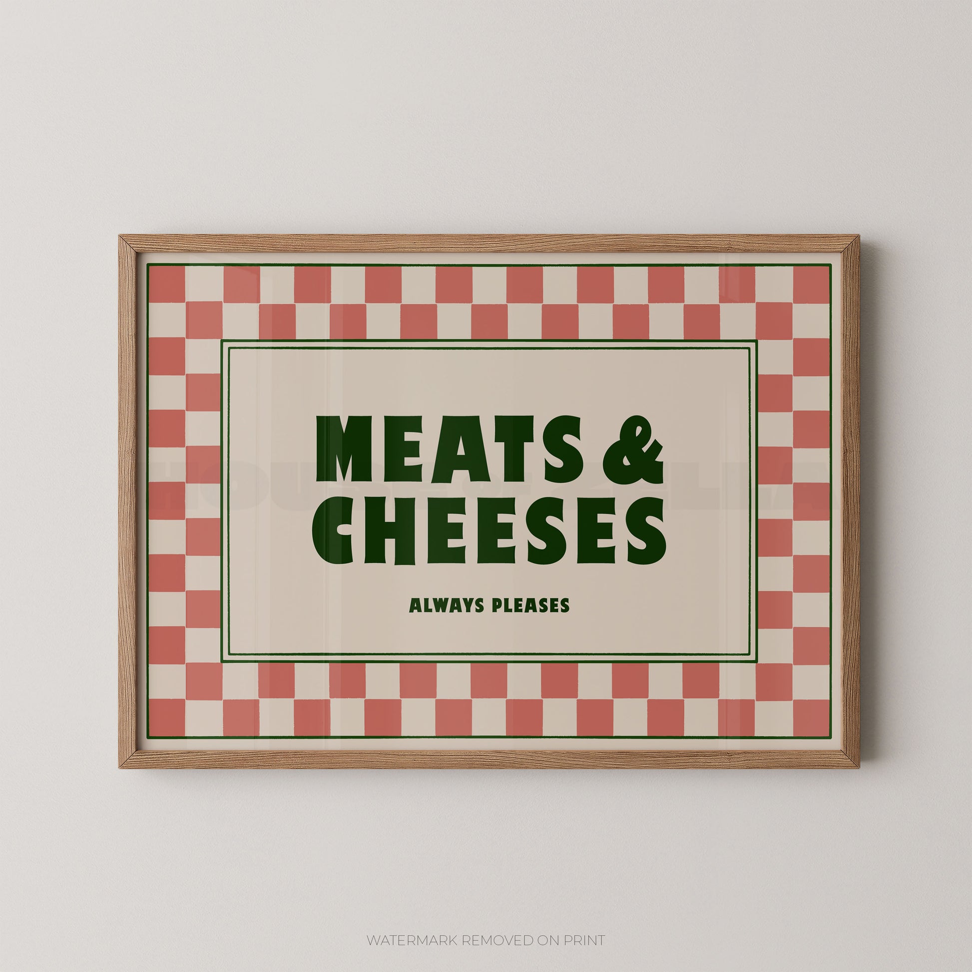 Framed sign with 'Meats & Cheeses Always Please' text on a checkered background