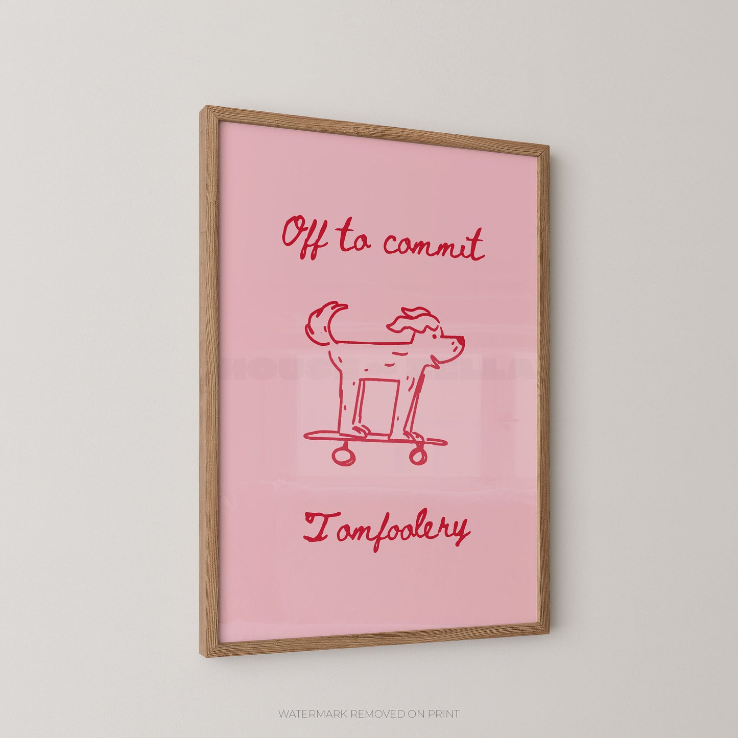 Framed pink poster with red text and dog illustration on a light gray background
