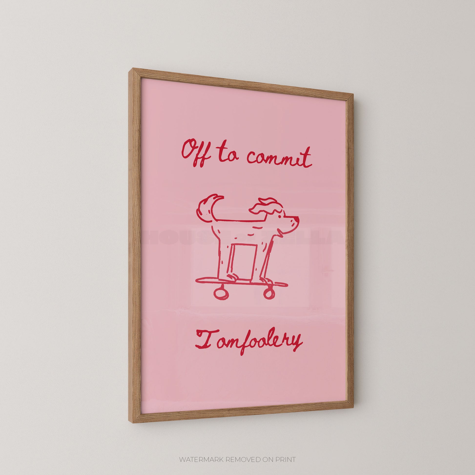 Framed pink poster with red text and dog illustration on a light gray background