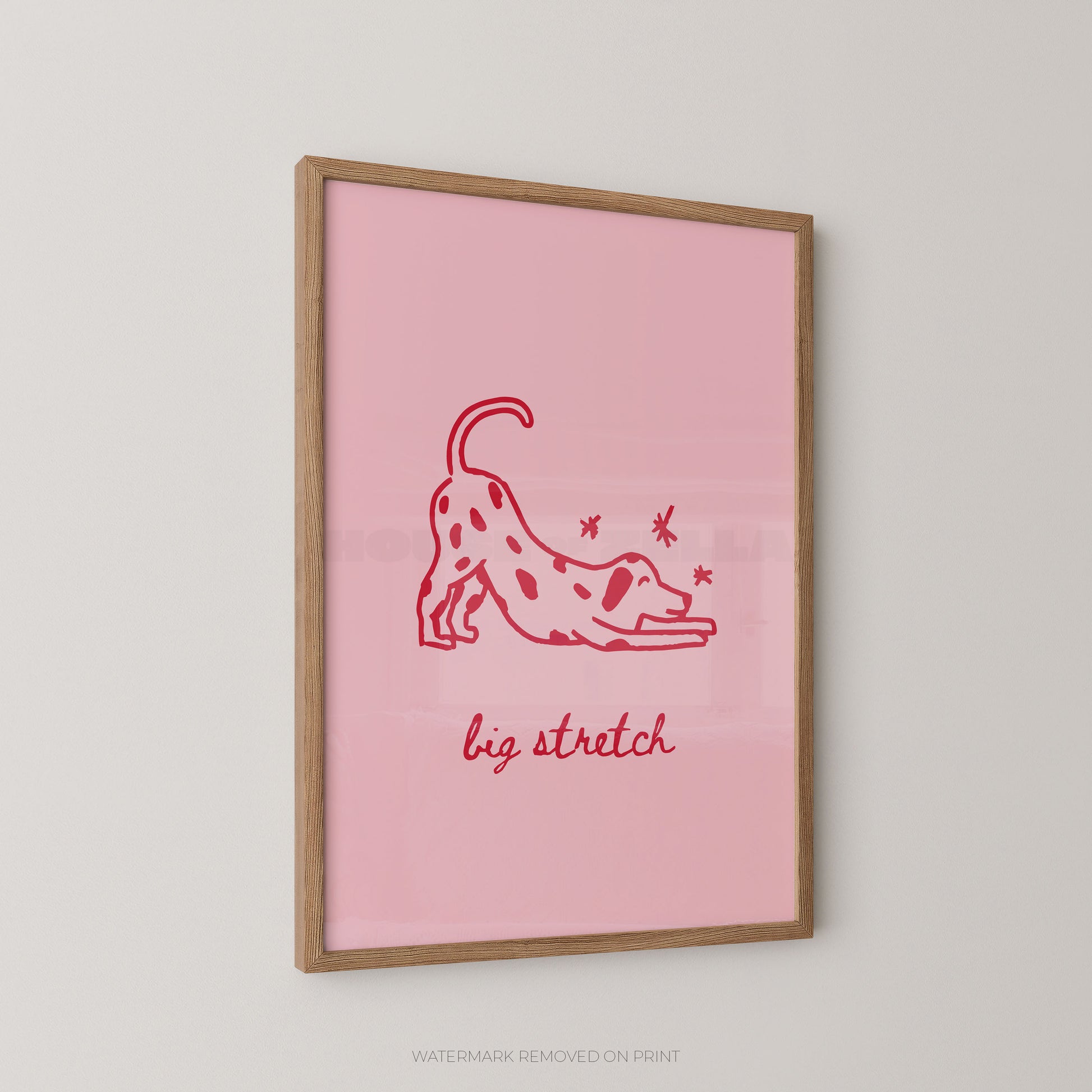 Framed pink poster with a red dog illustration and 'big stretch' text on a light gray background