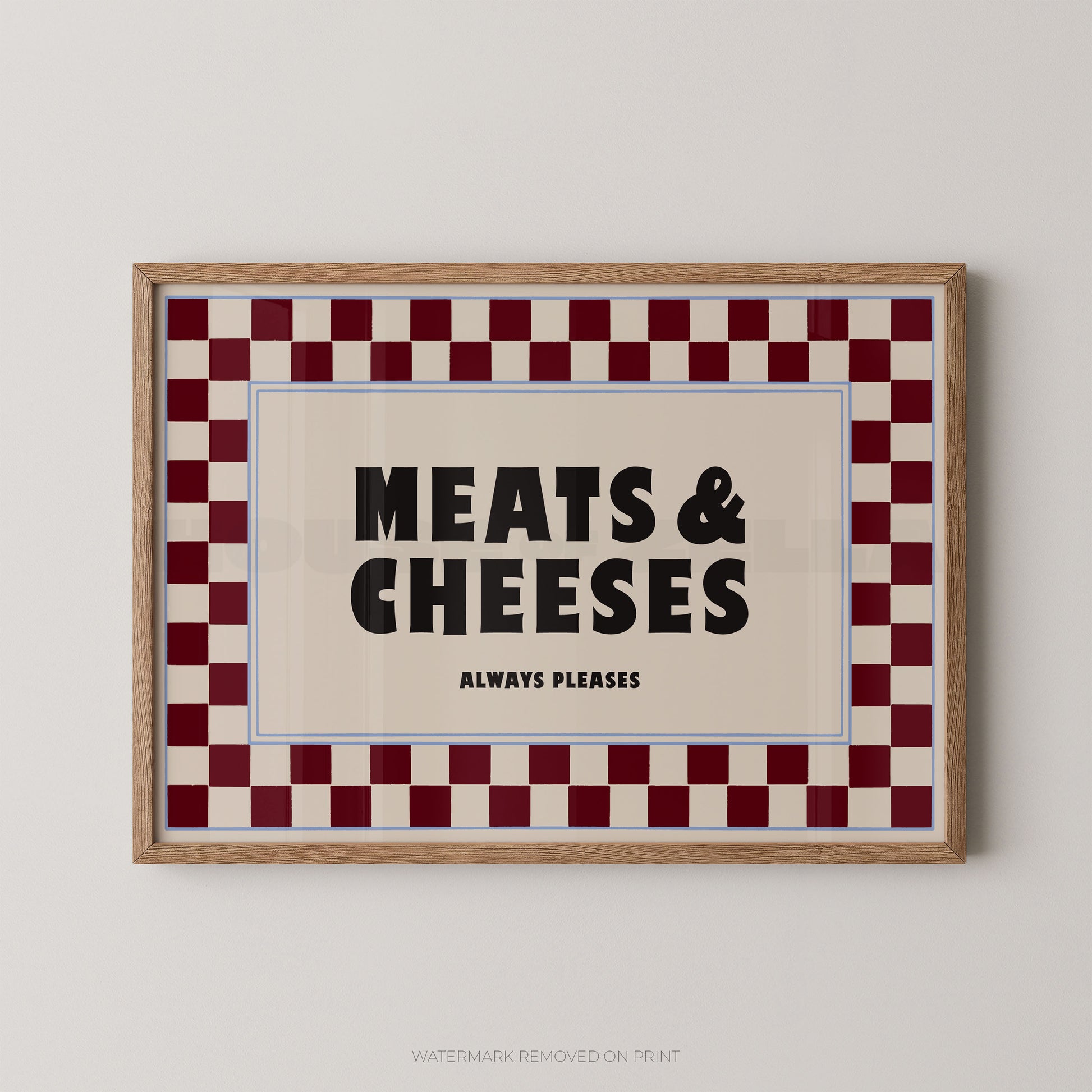 Framed sign with 'MEATS & CHEESES ALWAYS PLEASES' text on a checkered border.