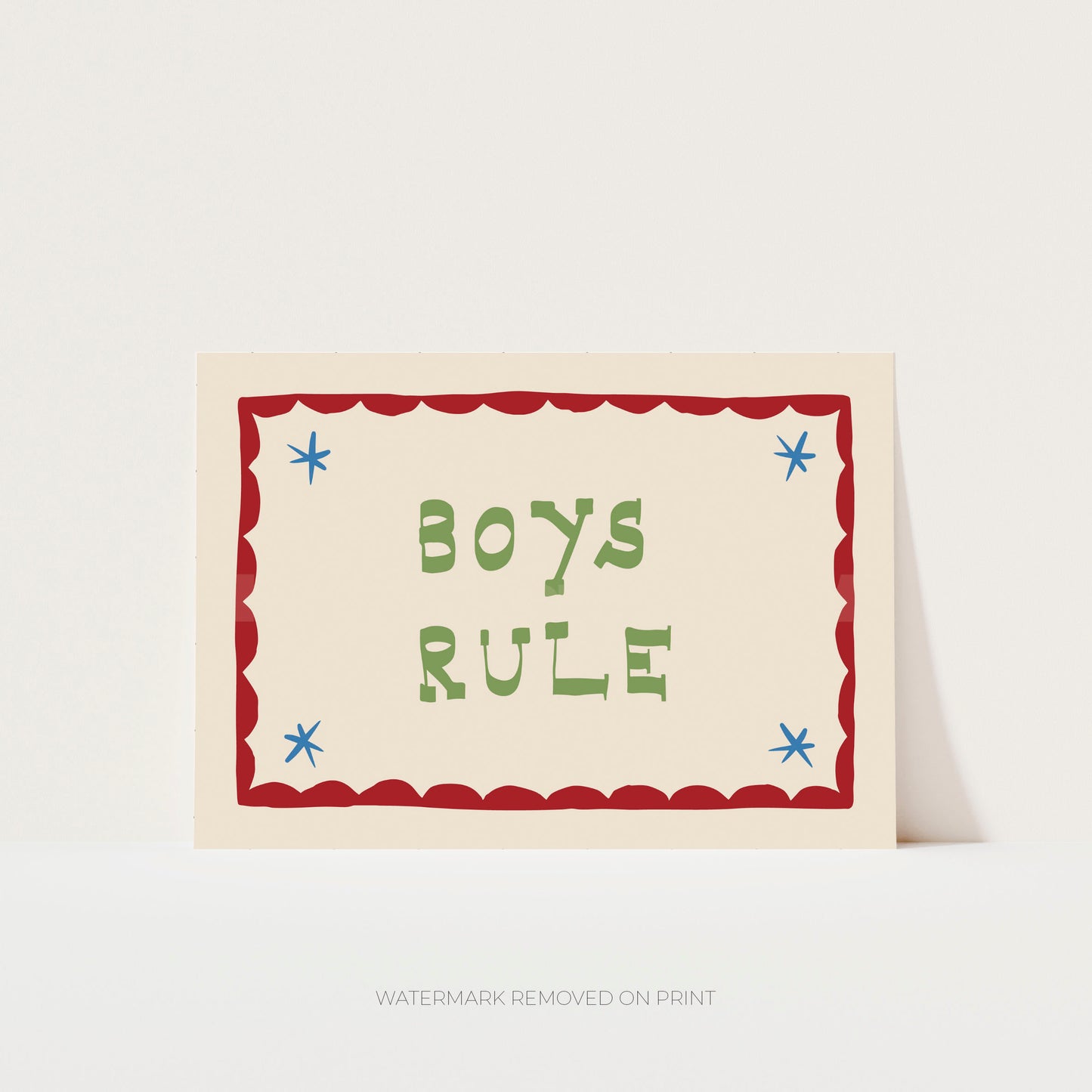 Boys Rule' art print showing green text on a beige background, with a red decorative border and blue stars in the corner.