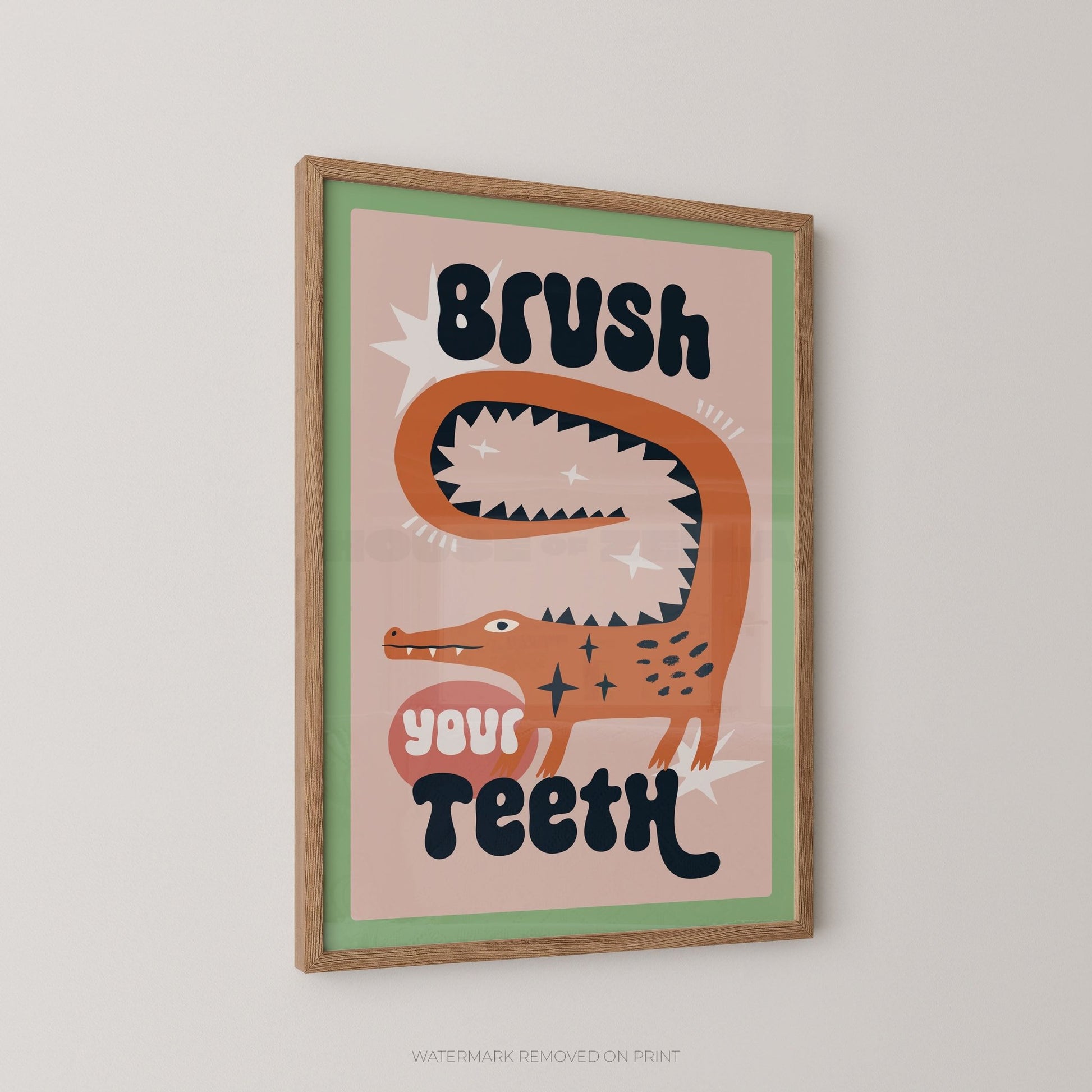 Brush Your Teeth bathroom wall art print featuring a playful crocodile illustration in pink, green and orange tones