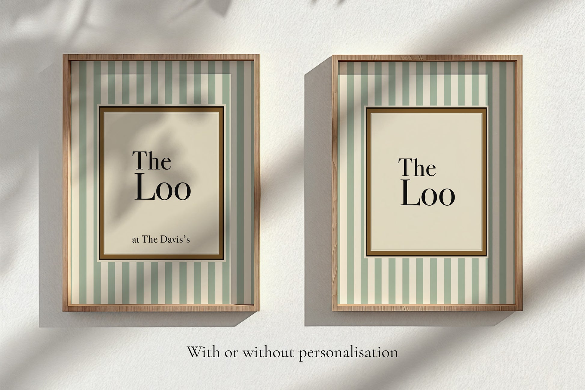 Two framed prints with 'The Loo' text on a striped background