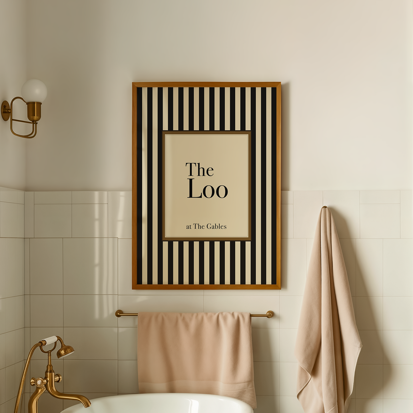 Bathroom interior with a bathtub, towel rack, and framed picture on the wall.
