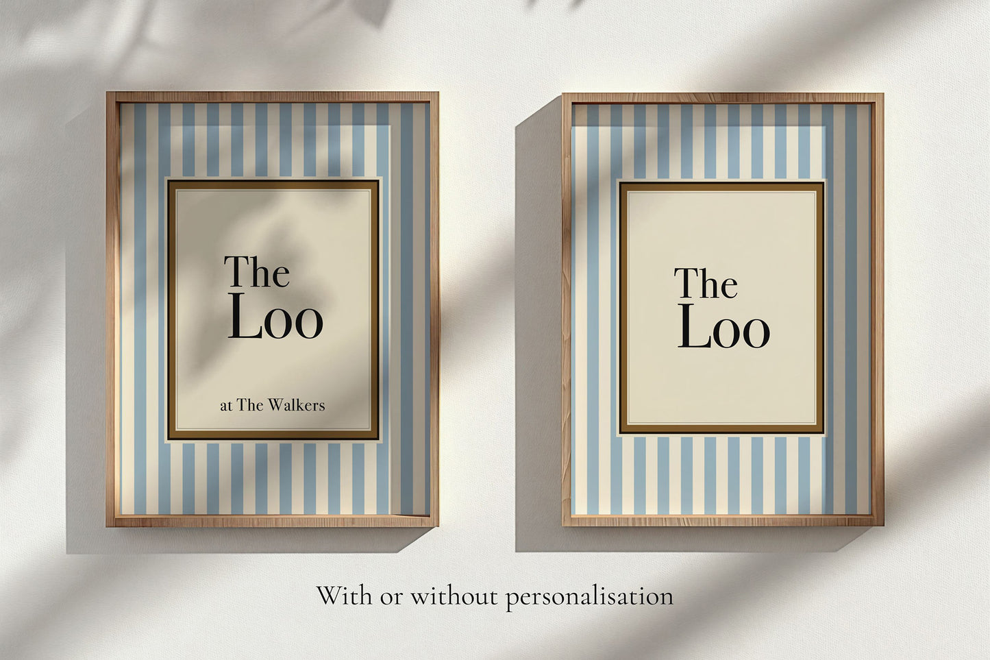 Two framed prints with 'The Loo' text on a striped background