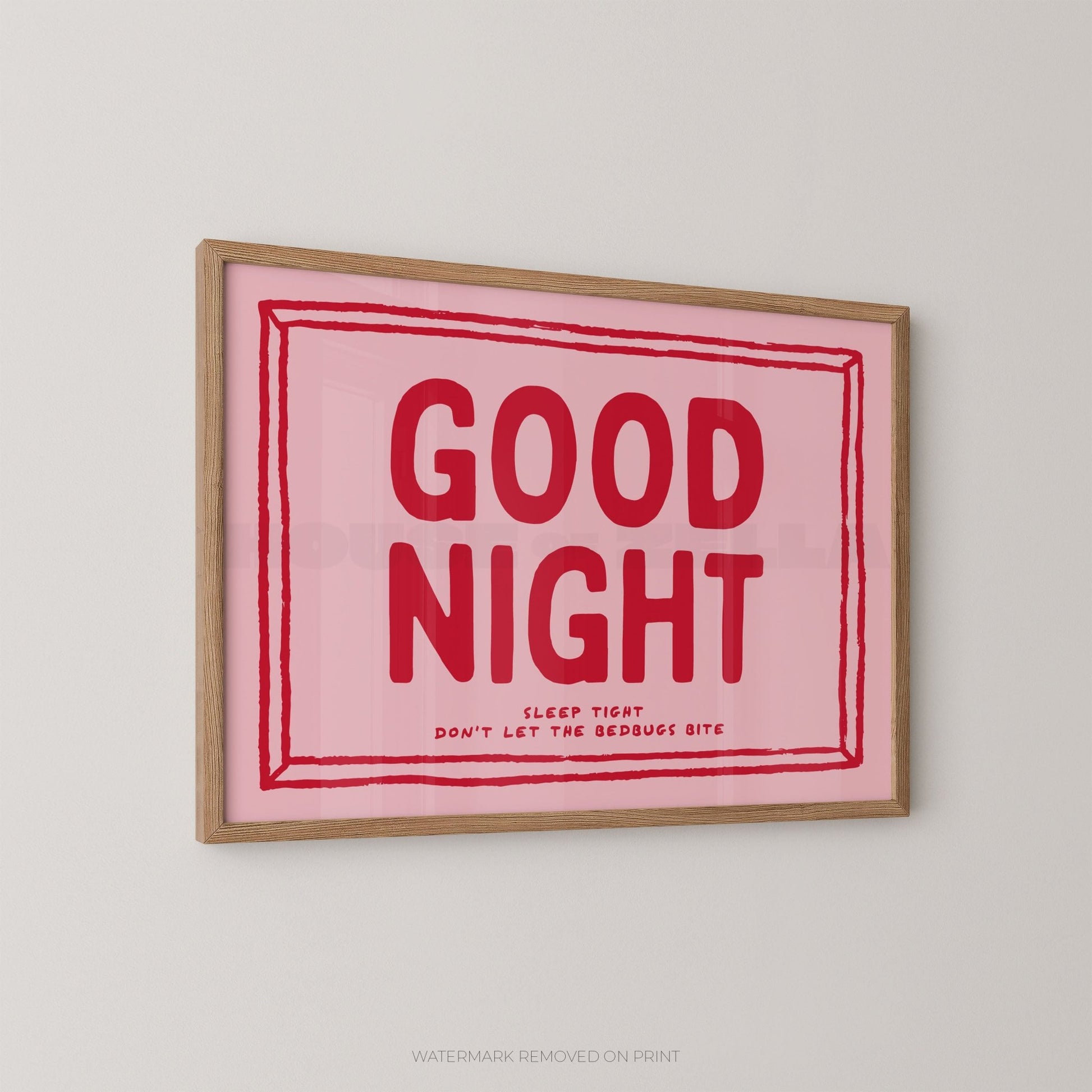 Framed artwork with 'GOOD NIGHT' text on a pink background