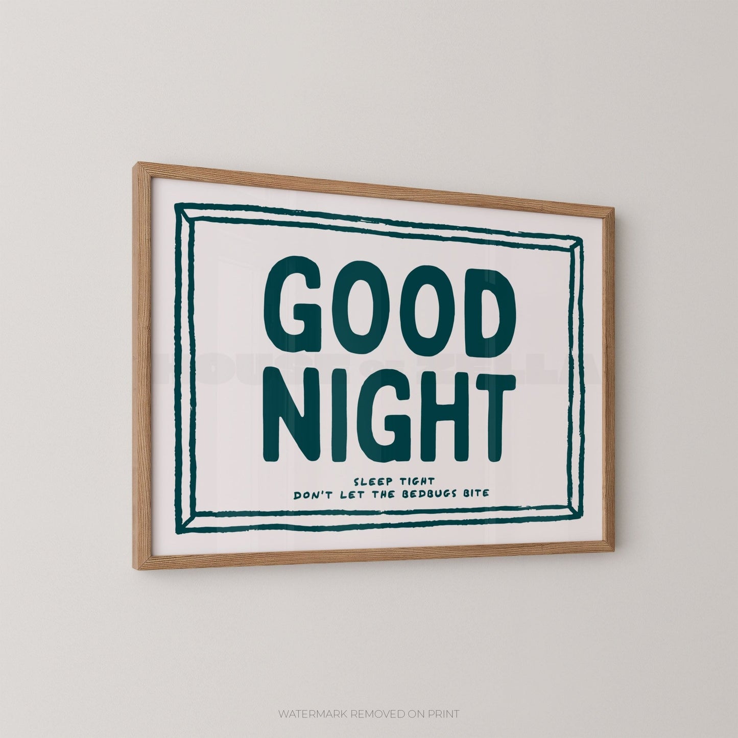 Framed print with 'Good Night' text on a plain wall