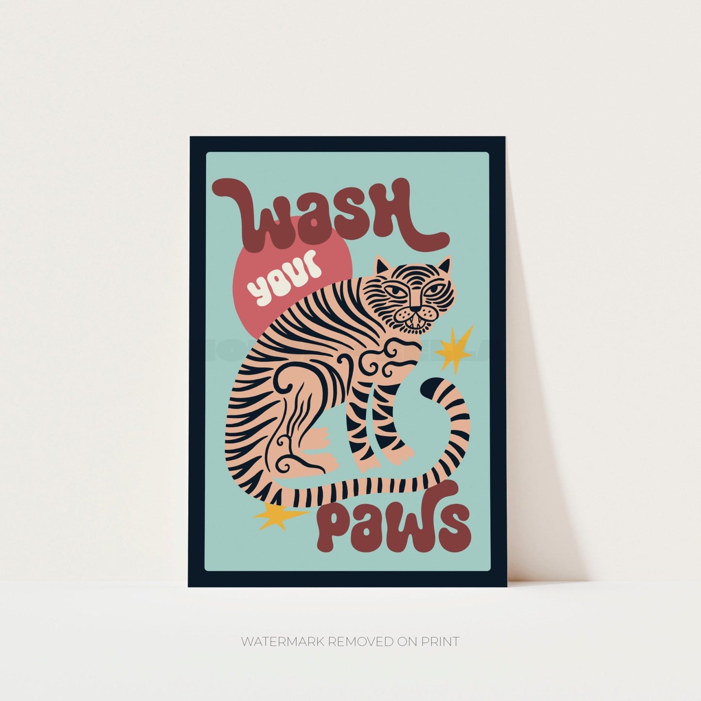 Framed poster with a tiger illustration and text 'Wash your paws' on a light blue background.