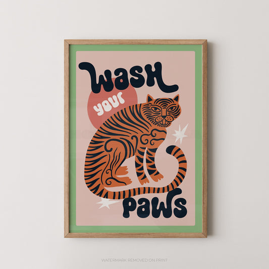 Framed artwork with a tiger illustration and text 'Wash your paws' on a light background